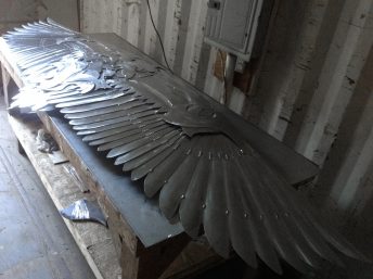 metal sculpture bird