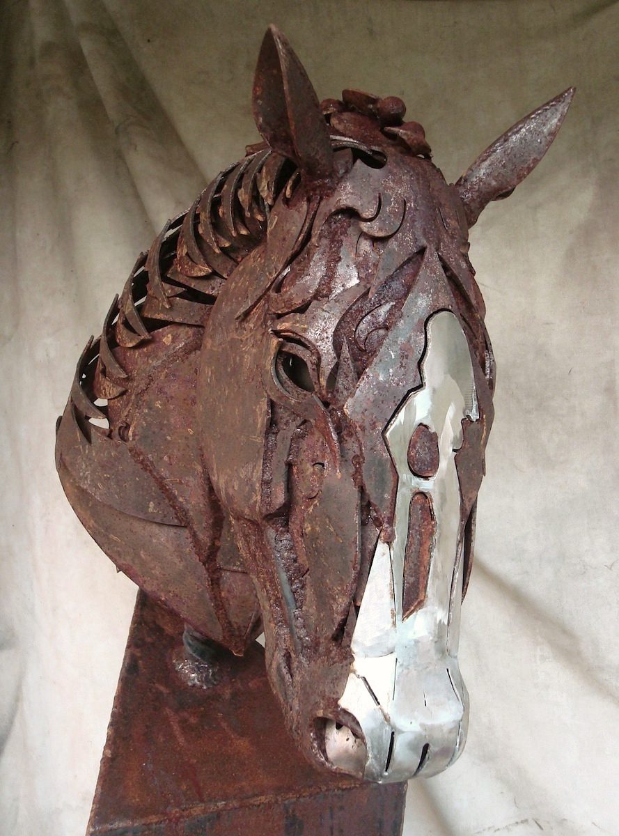 metal horse head statue