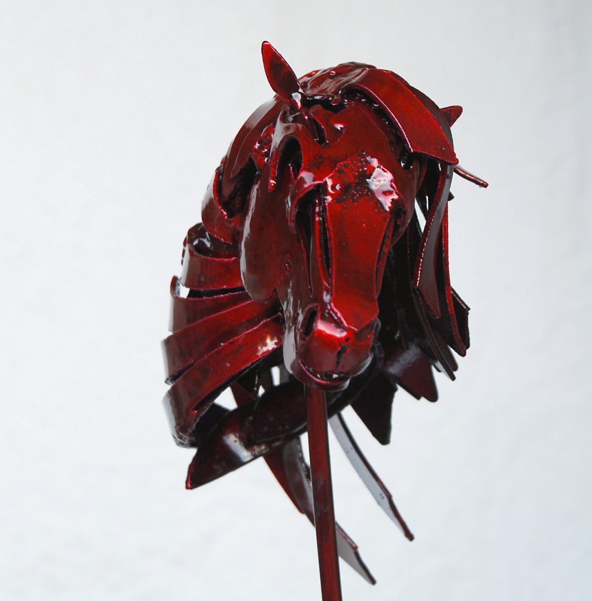 red horse head sculpture